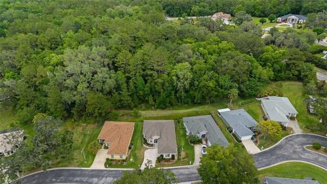 2631 SW 20th Cir, Ocala, FL 34471 - aerial overview of property's location featuring a forest and nearby suburban area