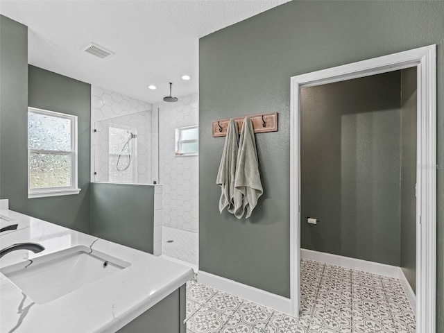 5330 NE 111th Lane Rd, Anthony, FL 32617 - full bath featuring walk in shower, vanity, baseboards, and recessed lighting