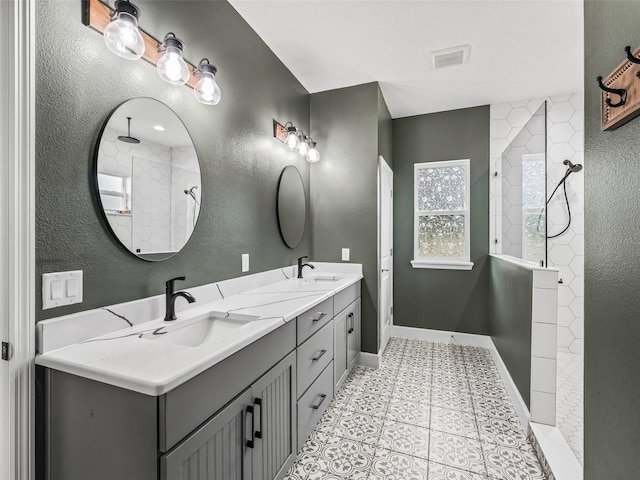 5330 NE 111th Lane Rd, Anthony, FL 32617 - bathroom with walk in shower, baseboards, double vanity, and a textured wall