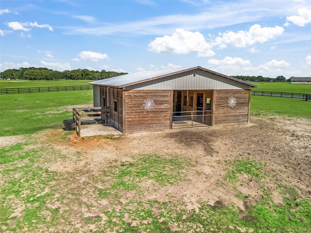 5330 NE 111th Lane Rd, Anthony, FL 32617 - view of outdoor structure featuring an exterior structure, a rural view, and an outdoor structure