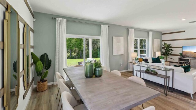 8647 SW 44th Ter, Ocala, FL 34476 - dining area featuring baseboards, light wood-style flooring, and recessed lighting