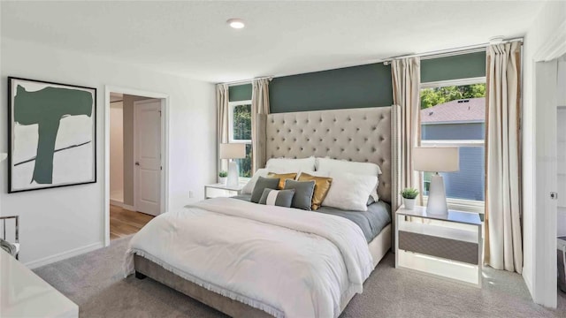 8647 SW 44th Ter, Ocala, FL 34476 - bedroom featuring carpet floors and baseboards