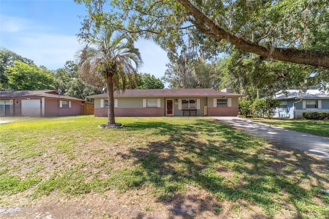 6060 SE 119th Pl, Belleview, FL 34420 - ranch-style home with driveway