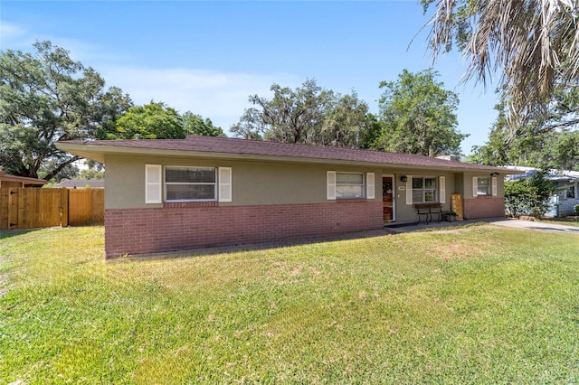 6060 SE 119th Pl, Belleview, FL 34420 - single story home featuring brick siding and stucco siding