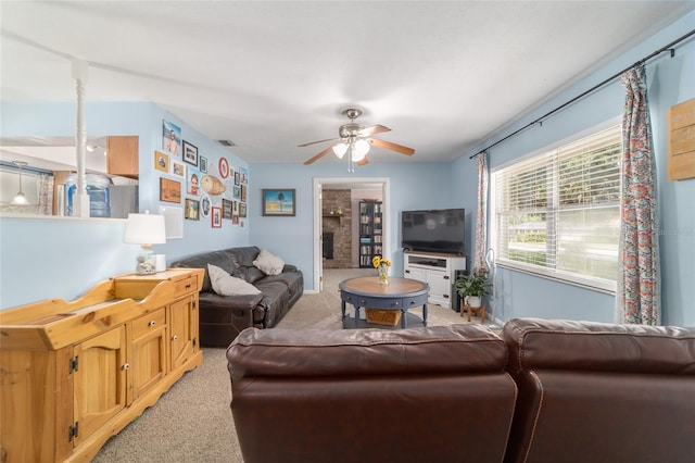 6060 SE 119th Pl, Belleview, FL 34420 - living area with light colored carpet and ceiling fan