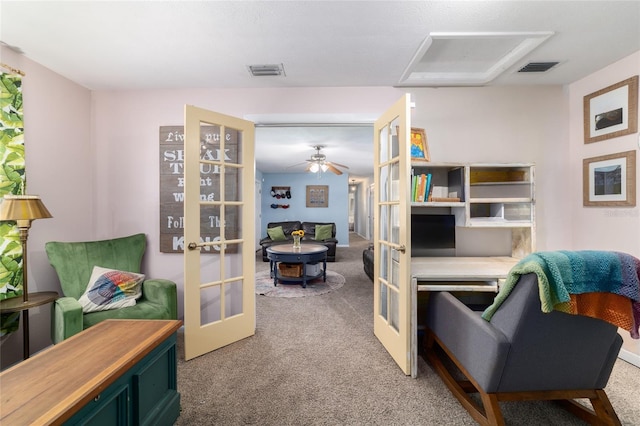 6060 SE 119th Pl, Belleview, FL 34420 - living room with french doors and carpet