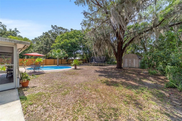 6060 SE 119th Pl, Belleview, FL 34420 - view of yard with a trampoline