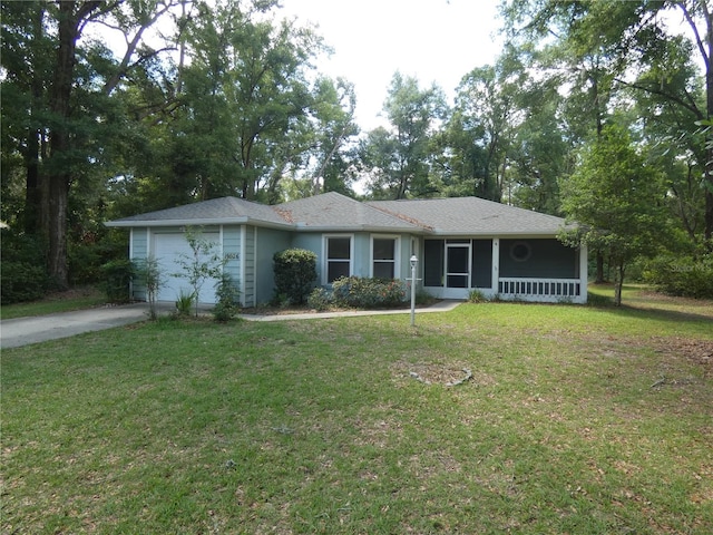 19026 SW 100th Pl, Dunnellon, FL 34432 - single story home featuring a garage, a front yard, and driveway