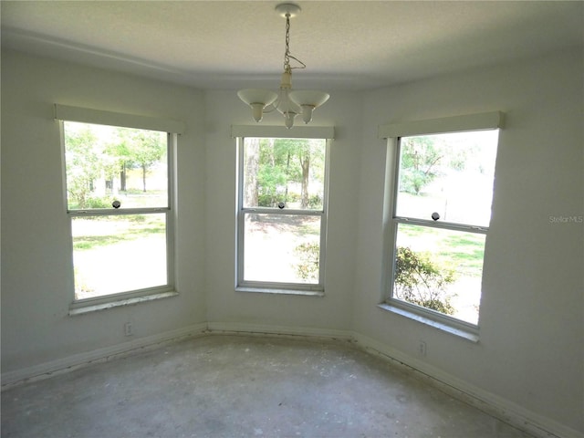 19026 SW 100th Pl, Dunnellon, FL 34432 - unfurnished dining area with a chandelier and healthy amount of natural light