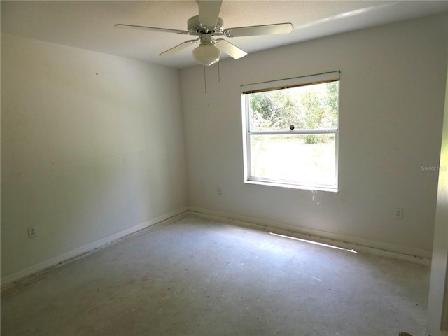 19026 SW 100th Pl, Dunnellon, FL 34432 - spare room with a ceiling fan and baseboards