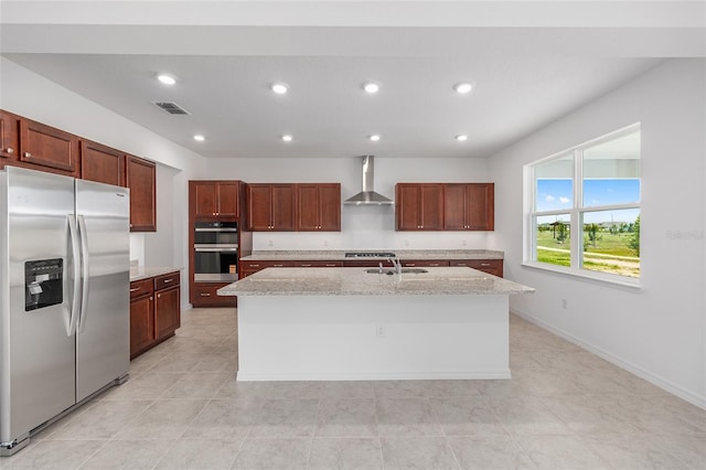 7536 SW 60th St, Ocala, FL 34476 - kitchen with appliances with stainless steel finishes, wall chimney exhaust hood, a sink, a kitchen island with sink, and recessed lighting