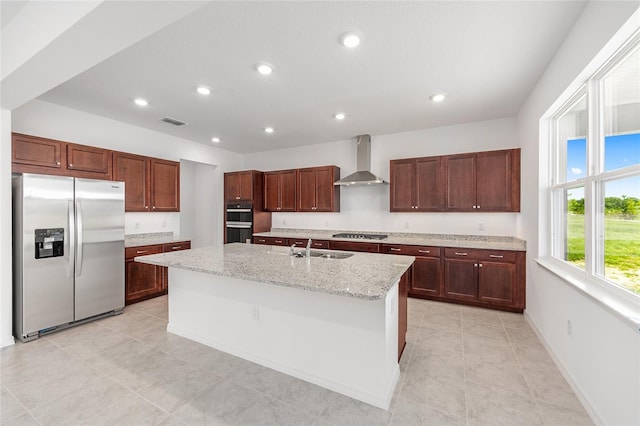 7536 SW 60th St, Ocala, FL 34476 - kitchen featuring appliances with stainless steel finishes, wall chimney range hood, a sink, a center island with sink, and recessed lighting
