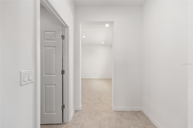 7536 SW 60th St, Ocala, FL 34476 - hallway featuring light tile patterned flooring, baseboards, and recessed lighting