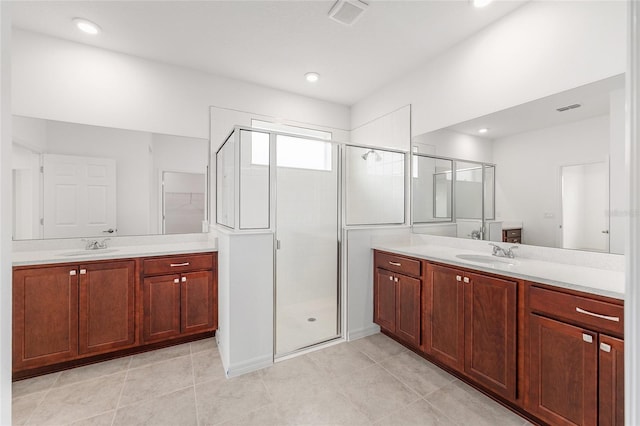 7536 SW 60th St, Ocala, FL 34476 - full bath featuring a stall shower, two vanities, tile patterned floors, and recessed lighting