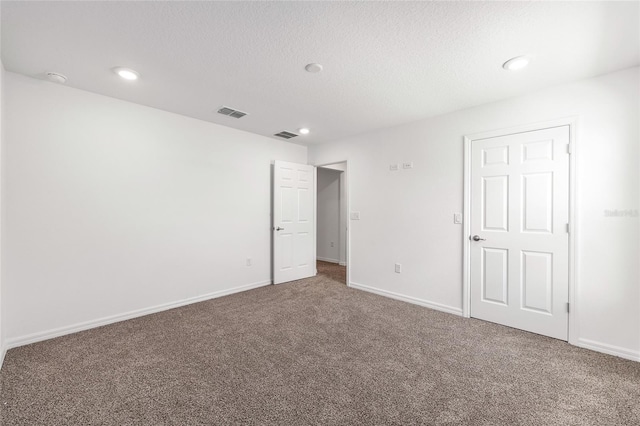 7536 SW 60th St, Ocala, FL 34476 - unfurnished bedroom featuring carpet floors, recessed lighting, baseboards, and a textured ceiling