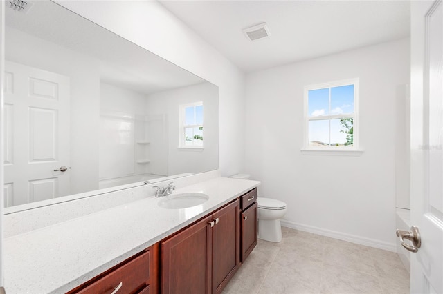 7536 SW 60th St, Ocala, FL 34476 - full bath featuring toilet, vanity, and baseboards
