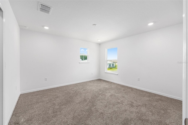 7536 SW 60th St, Ocala, FL 34476 - carpeted empty room featuring baseboards and recessed lighting