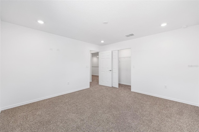 7536 SW 60th St, Ocala, FL 34476 - unfurnished bedroom featuring carpet, baseboards, recessed lighting, and a closet