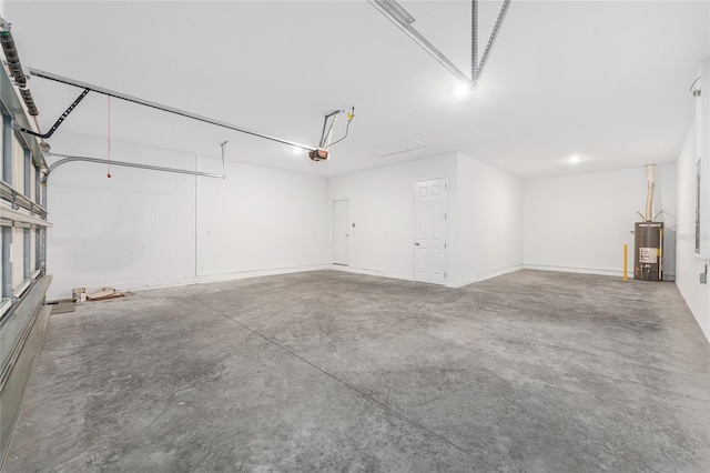7536 SW 60th St, Ocala, FL 34476 - garage with gas water heater and a garage door opener