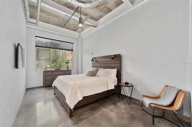 302 SE Broadway St Unit 240, Ocala, FL 34471 - bedroom featuring finished concrete flooring, baseboards, and a ceiling fan