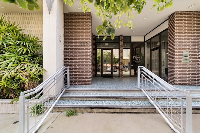 302 SE Broadway St Unit 240, Ocala, FL 34471 - view of exterior entry featuring brick siding