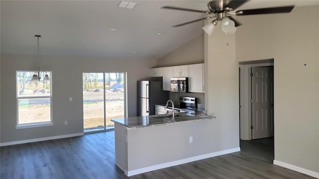 17645 SW 112th Ln, Dunnellon, FL 34432 - kitchen featuring stainless steel appliances, dark wood-style floors, ceiling fan, white cabinetry, and a peninsula