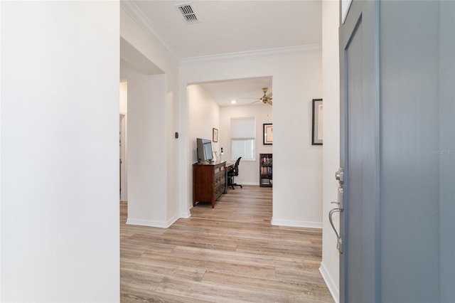 9309 SW 106th Ave, Ocala, FL 34481 - foyer with light wood-type flooring, crown molding, ceiling fan, and baseboards