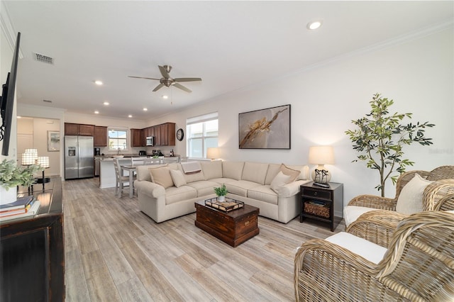 9309 SW 106th Ave, Ocala, FL 34481 - living area featuring ornamental molding, light wood-style floors, ceiling fan, recessed lighting, and baseboards