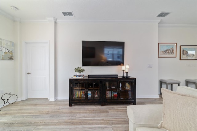 9309 SW 106th Ave, Ocala, FL 34481 - living area featuring ornamental molding, wood finished floors, and baseboards