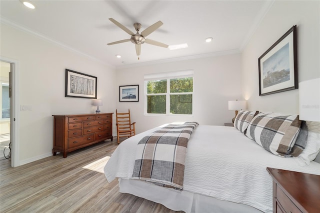 9309 SW 106th Ave, Ocala, FL 34481 - bedroom featuring light wood-type flooring, ornamental molding, recessed lighting, a ceiling fan, and baseboards
