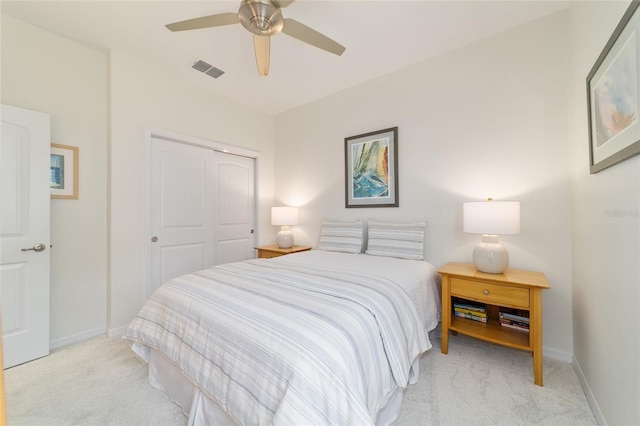 9309 SW 106th Ave, Ocala, FL 34481 - bedroom featuring light colored carpet, a closet, baseboards, and a ceiling fan