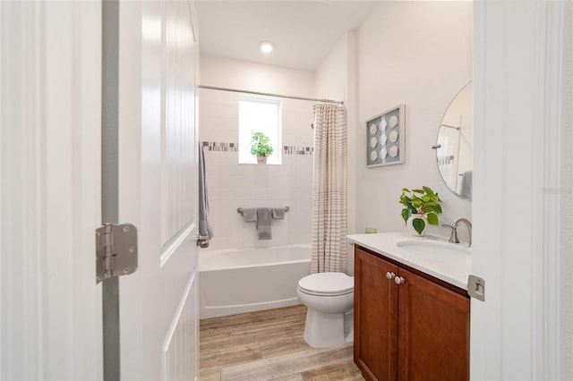 9309 SW 106th Ave, Ocala, FL 34481 - bathroom featuring wood finished floors, vanity, toilet, and shower / tub combo with curtain