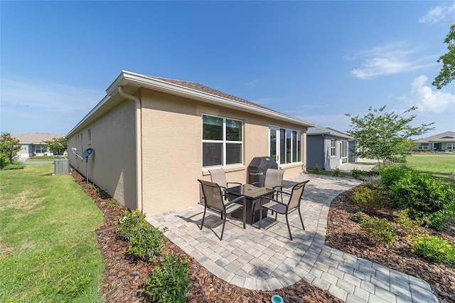 9309 SW 106th Ave, Ocala, FL 34481 - view of patio / terrace featuring central AC and area for grilling
