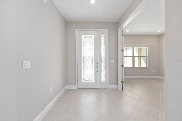 10569 SW 98th Pl, Ocala, FL 34481 - foyer entrance featuring light tile patterned flooring, baseboards, and recessed lighting