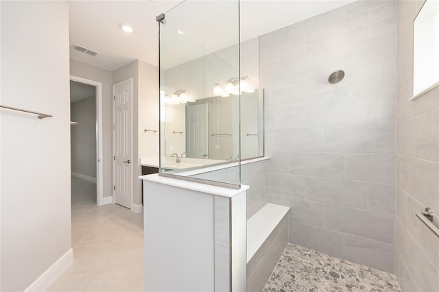 10569 SW 98th Pl, Ocala, FL 34481 - bathroom featuring walk in shower, tile patterned flooring, and vanity
