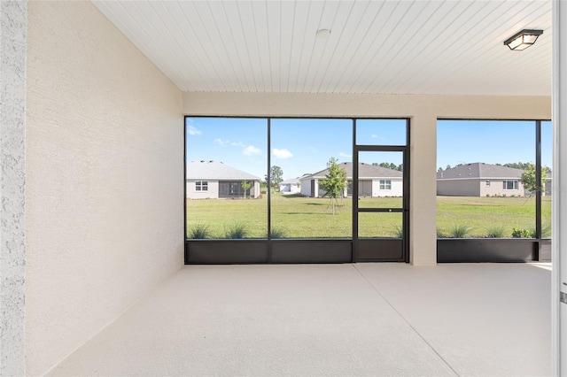 10569 SW 98th Pl, Ocala, FL 34481 - unfurnished sunroom featuring a residential view