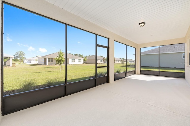 10569 SW 98th Pl, Ocala, FL 34481 - unfurnished sunroom with a residential view