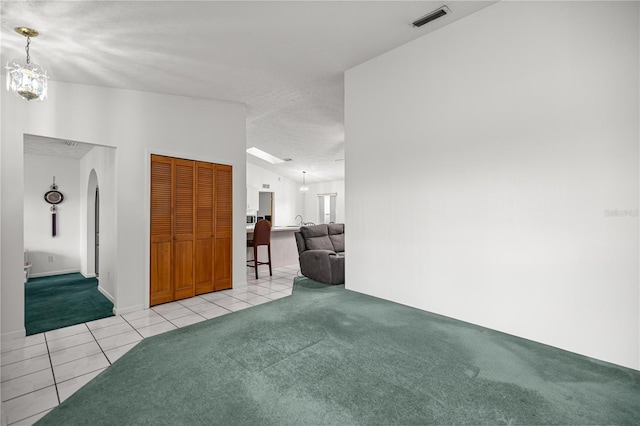 2521 NW 45th Pl, Ocala, FL 34475 - interior space with arched walkways, tile patterned floors, and a textured ceiling
