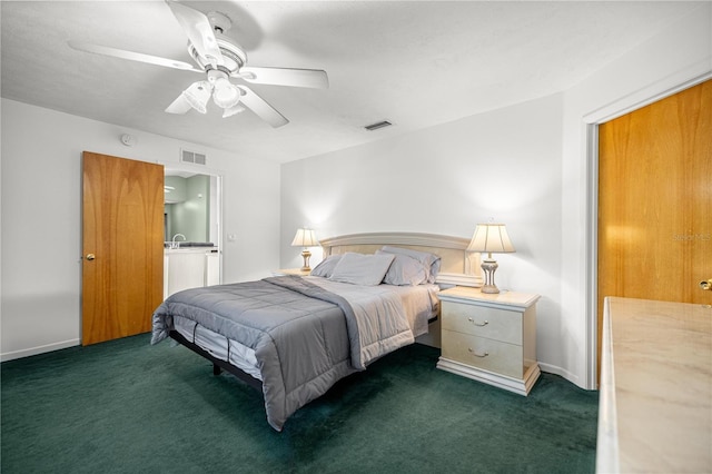 2521 NW 45th Pl, Ocala, FL 34475 - bedroom featuring dark carpet, ceiling fan, a sink, and baseboards