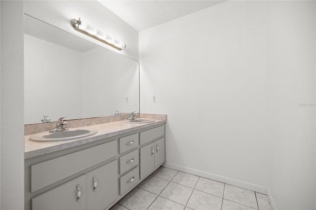 2521 NW 45th Pl, Ocala, FL 34475 - bathroom with double vanity and baseboards