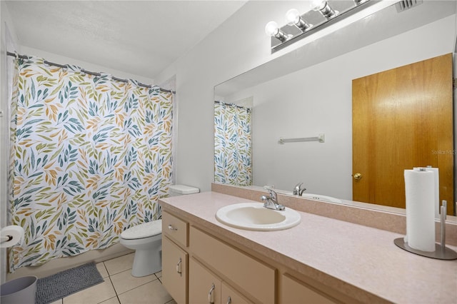 2521 NW 45th Pl, Ocala, FL 34475 - bathroom featuring tile patterned flooring, toilet, vanity, and curtained shower