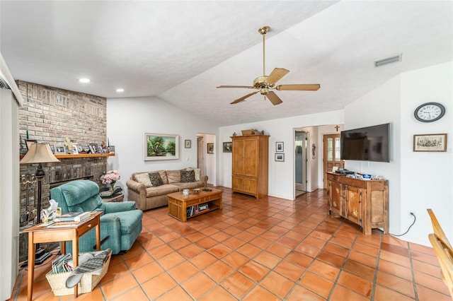living room with vaulted ceiling, a ceiling fan, a brick fireplace, light tile patterned floors, and recessed lighting