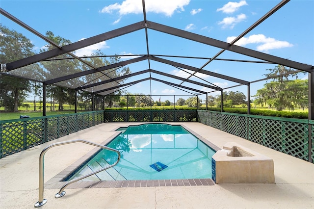 view of swimming pool featuring a patio area