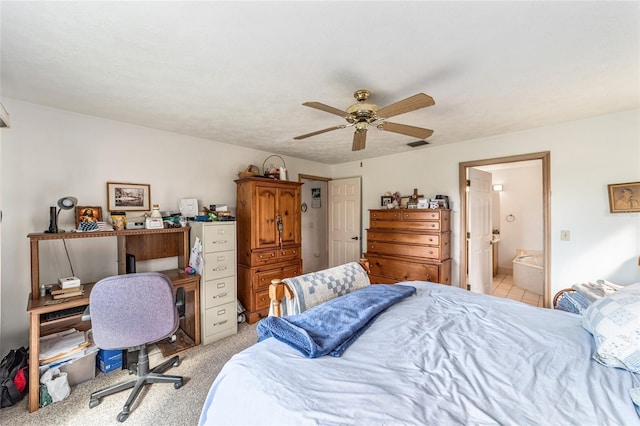 bedroom with connected bathroom, a ceiling fan, and light colored carpet