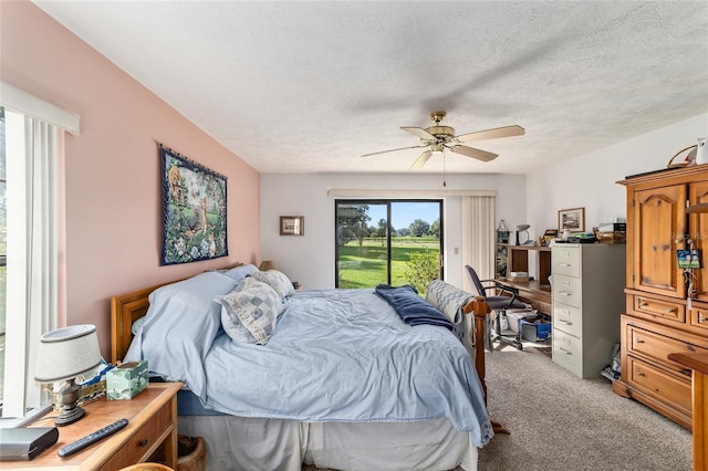 bedroom with light colored carpet, access to exterior, a textured ceiling, and ceiling fan