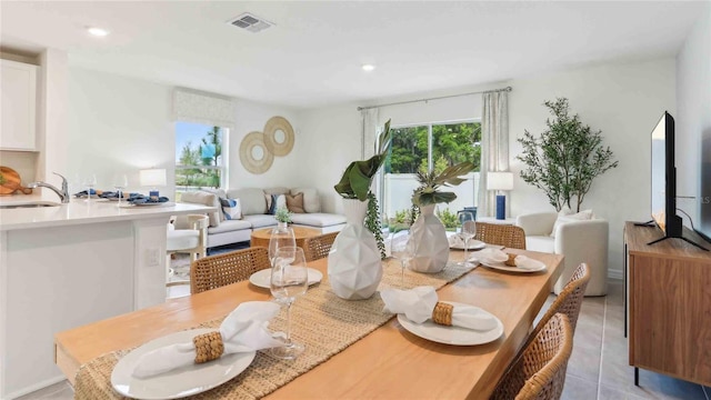 6573 SW 81st Loop, Ocala, FL 34476 - dining space with recessed lighting and light tile patterned floors