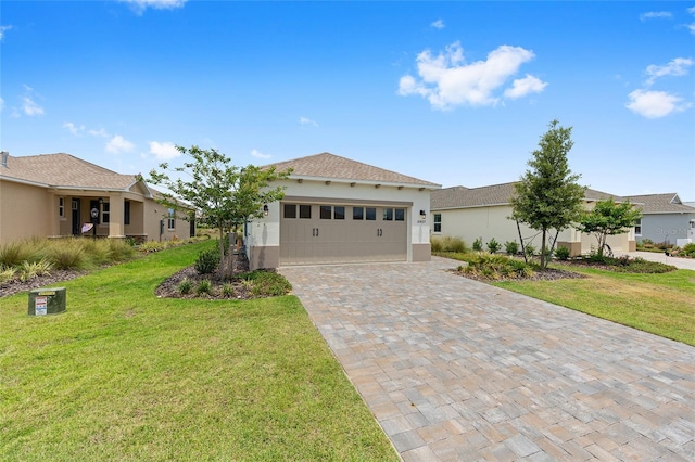 10427 SW 98th Place Rd, Ocala, FL 34481 - ranch-style house with stucco siding, an attached garage, a front yard, and decorative driveway