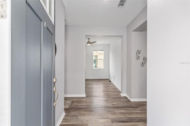 10427 SW 98th Place Rd, Ocala, FL 34481 - entrance foyer featuring wood finished floors, a ceiling fan, and baseboards