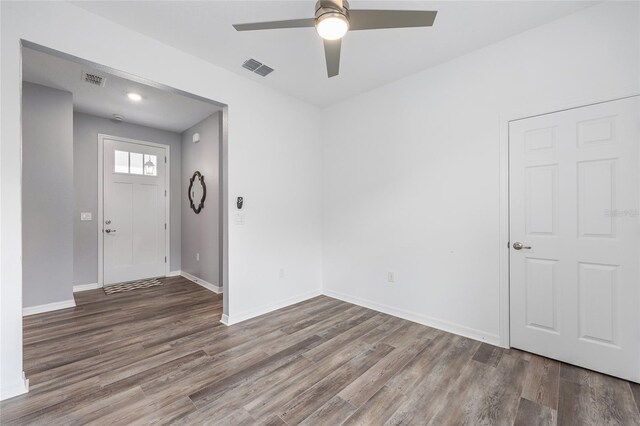 10427 SW 98th Place Rd, Ocala, FL 34481 - foyer with wood finished floors, ceiling fan, and baseboards