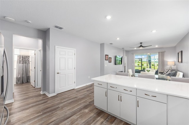 10427 SW 98th Place Rd, Ocala, FL 34481 - kitchen featuring open floor plan, wood finished floors, ceiling fan, light countertops, and recessed lighting